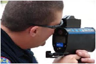 A LIDAR gun at the hands of a traffic policeman